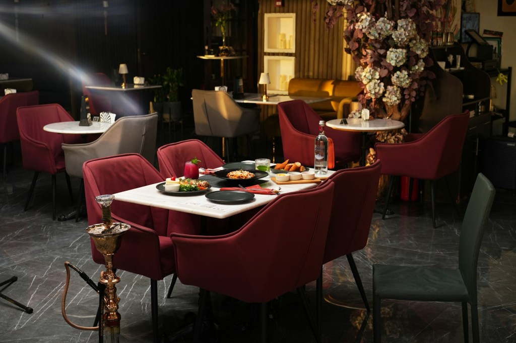 Restaurant dining room with tables set for service